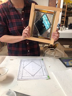 Student compares their creation to the design Cartoon.
